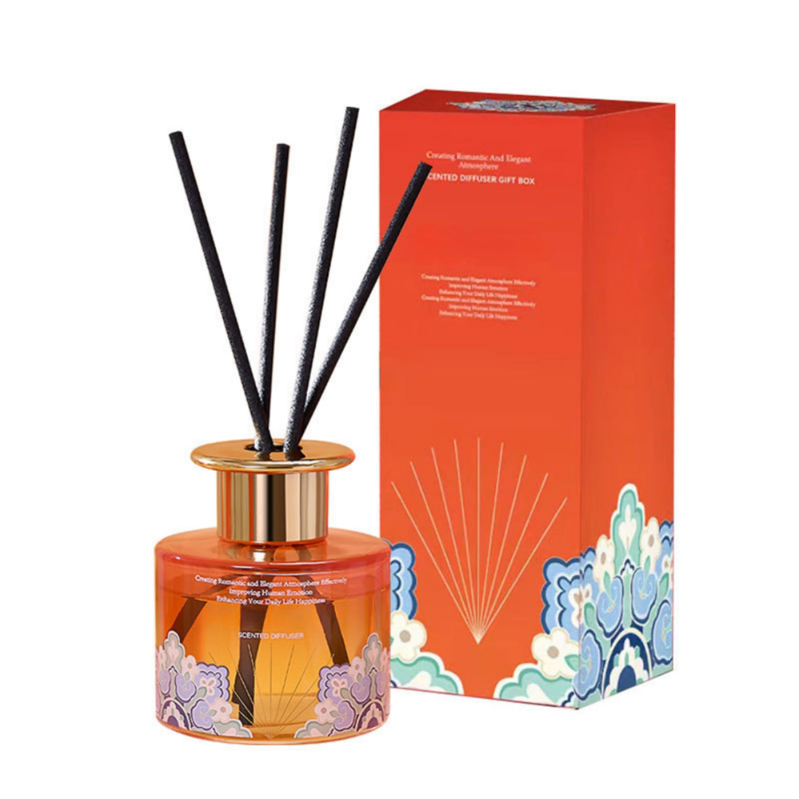 Eutopia Aureate reed diffuser in amber glass beside its gilded gift box